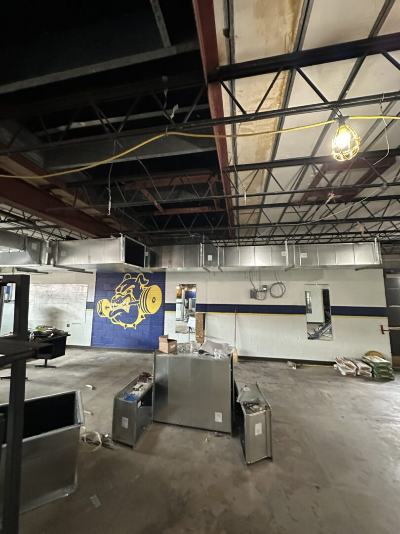 Interior renovation with exposed ceiling, HVAC units