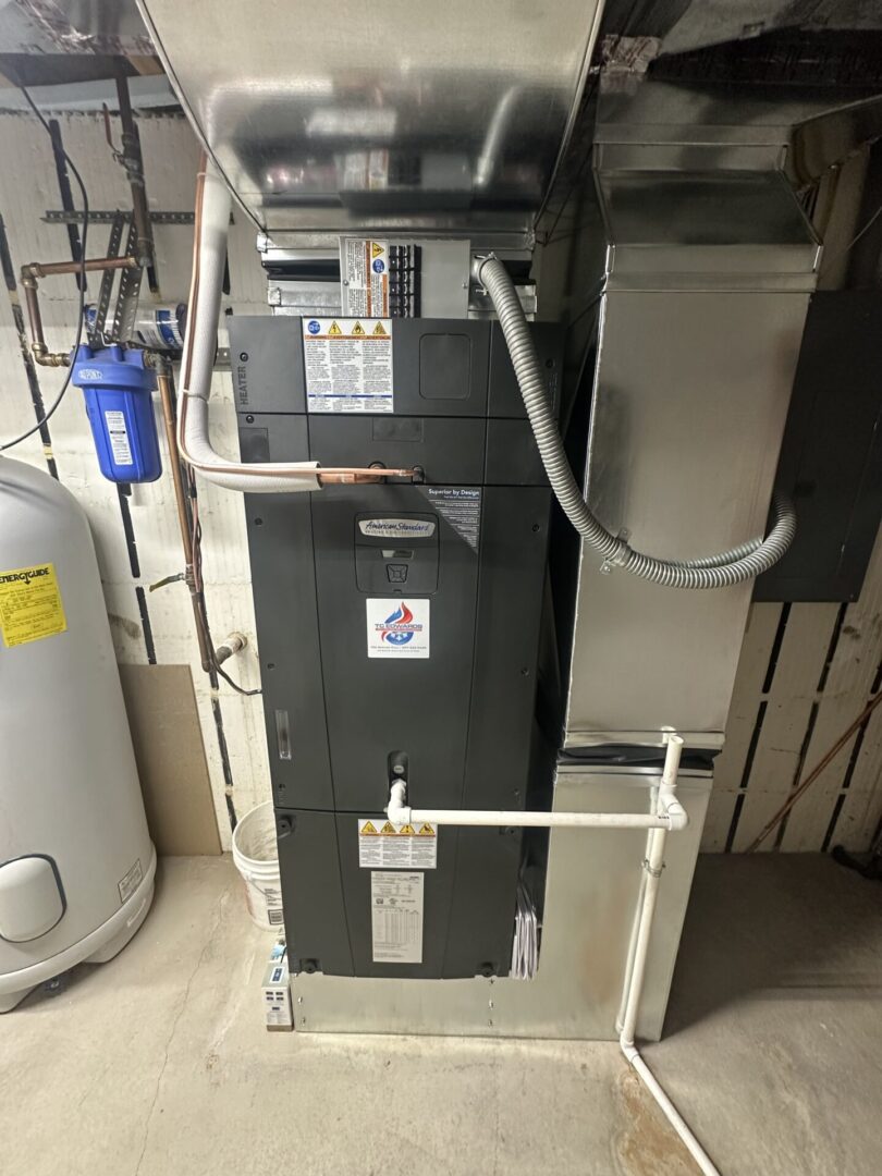 Basement HVAC air handler with pipes