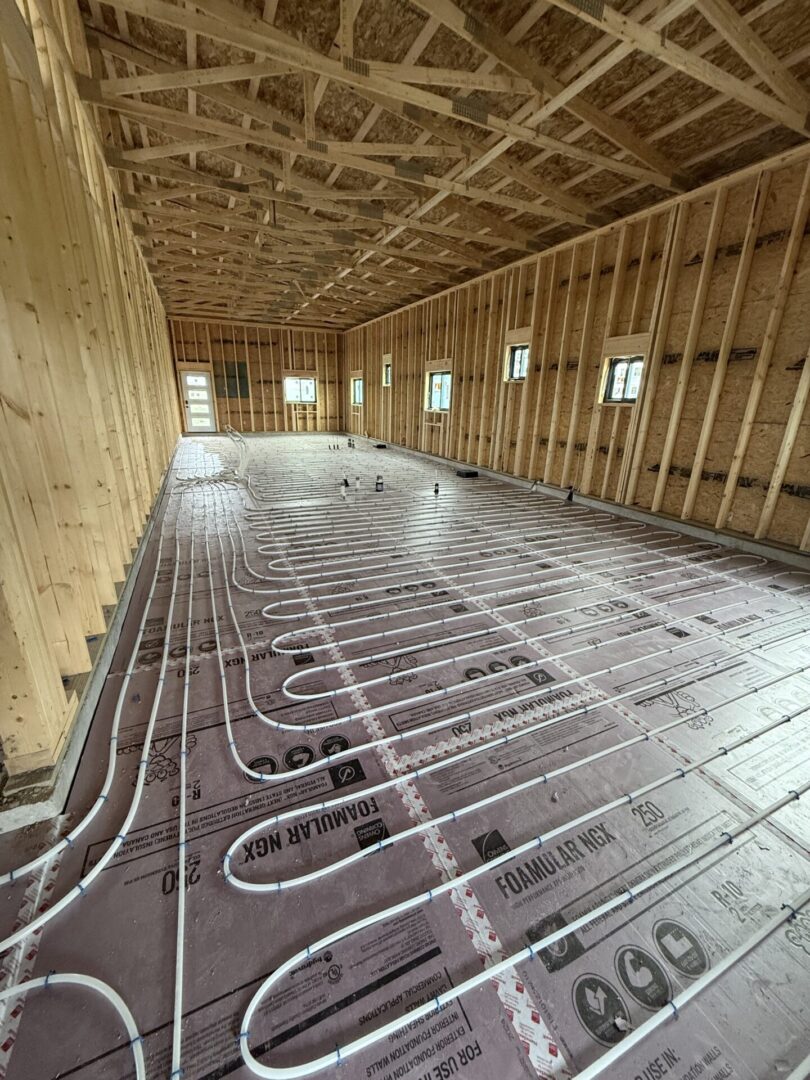 Wood-framed interior with radiant floor tubing