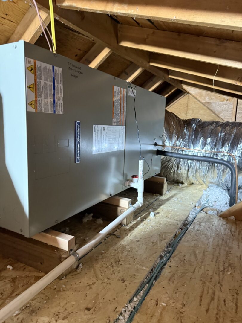 Ducted HVAC air handler installed in attic