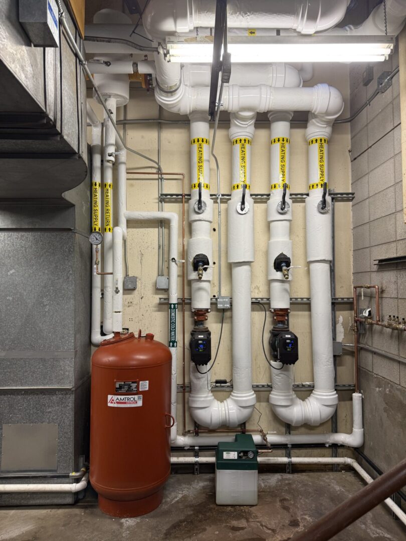 Mechanical room with insulated pipes and pumps